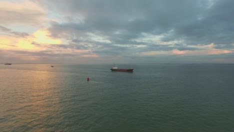 aerial: cargo ship coming from antwerp