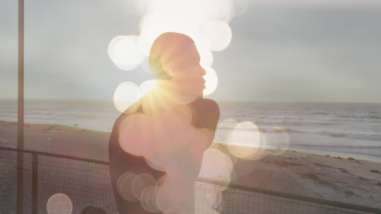 운동 하는 아프리카계 미국인 남성 위 에 반 ⁇ 이는 불빛 의 애니메이션