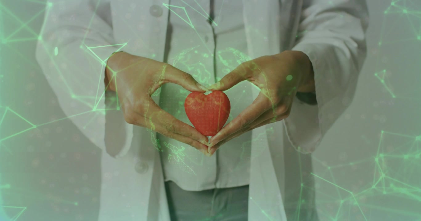 Ärztin passt Finger an, um ein rotes Herz zu zentrieren, während eine grüne Netzwerküberlagerung Gesundheitsdaten anzeigt.