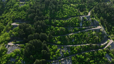 aerial footage over serpentine road in kotor montenegro