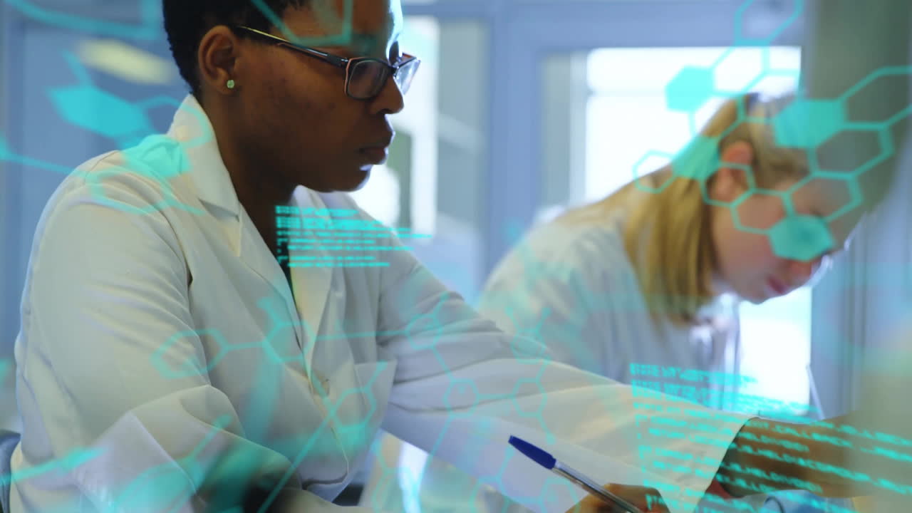 Scientists working in laboratory with digital data processing animation overlay
