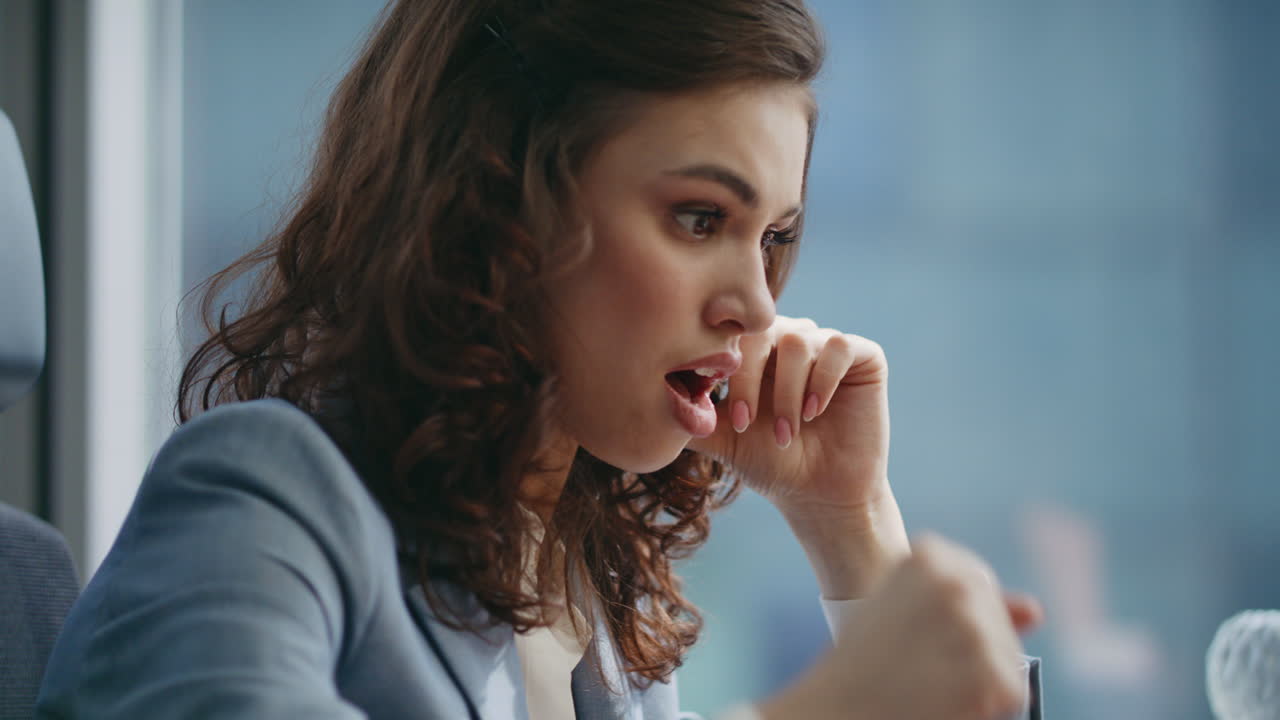 Angry business lady feeling stress working at laptop computer in office close up
