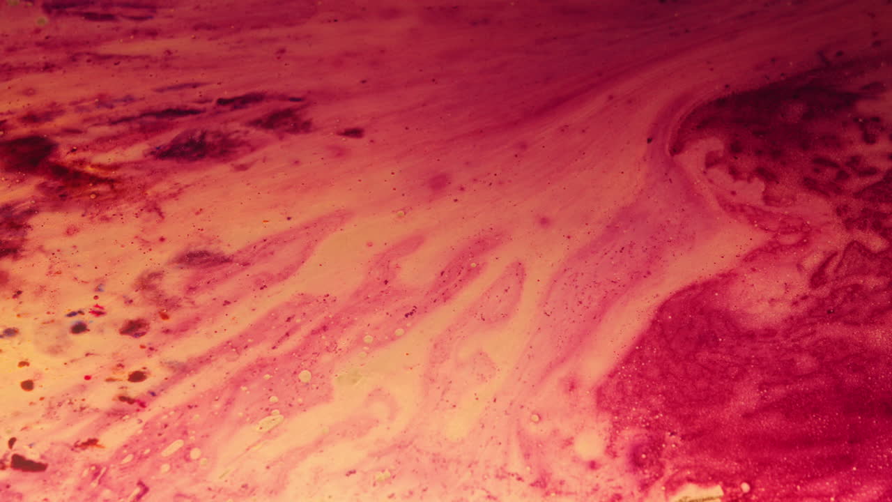 Colourful, organic, liquids macro shots buzzing and flowing