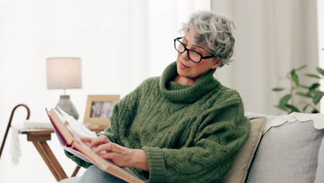 Woman-reading-funny-book-in-living-room-for-story