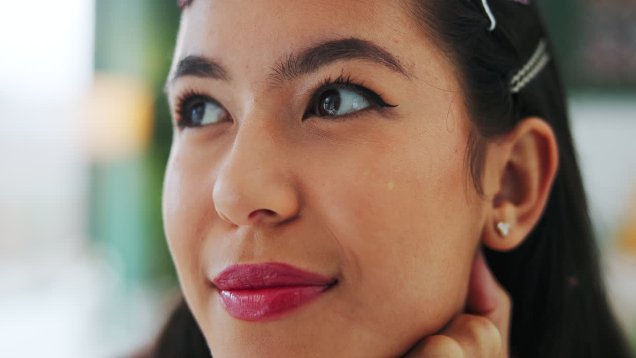 Portrait of a young woman with hair accessories and makeup