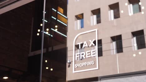 tax free shopping sign on a store window