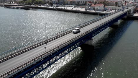 vehicles running over a bridge dolly-out