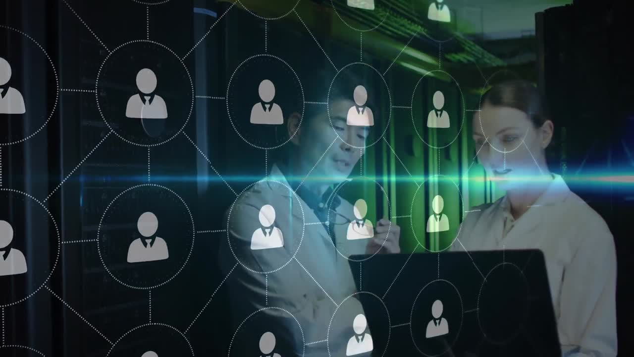 Animation of icons over diverse male and female it engineers with laptop by computer server