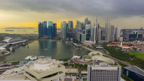 sunset storm sky singapore city famous marina bay downtown aerial timelapse panorama 4k