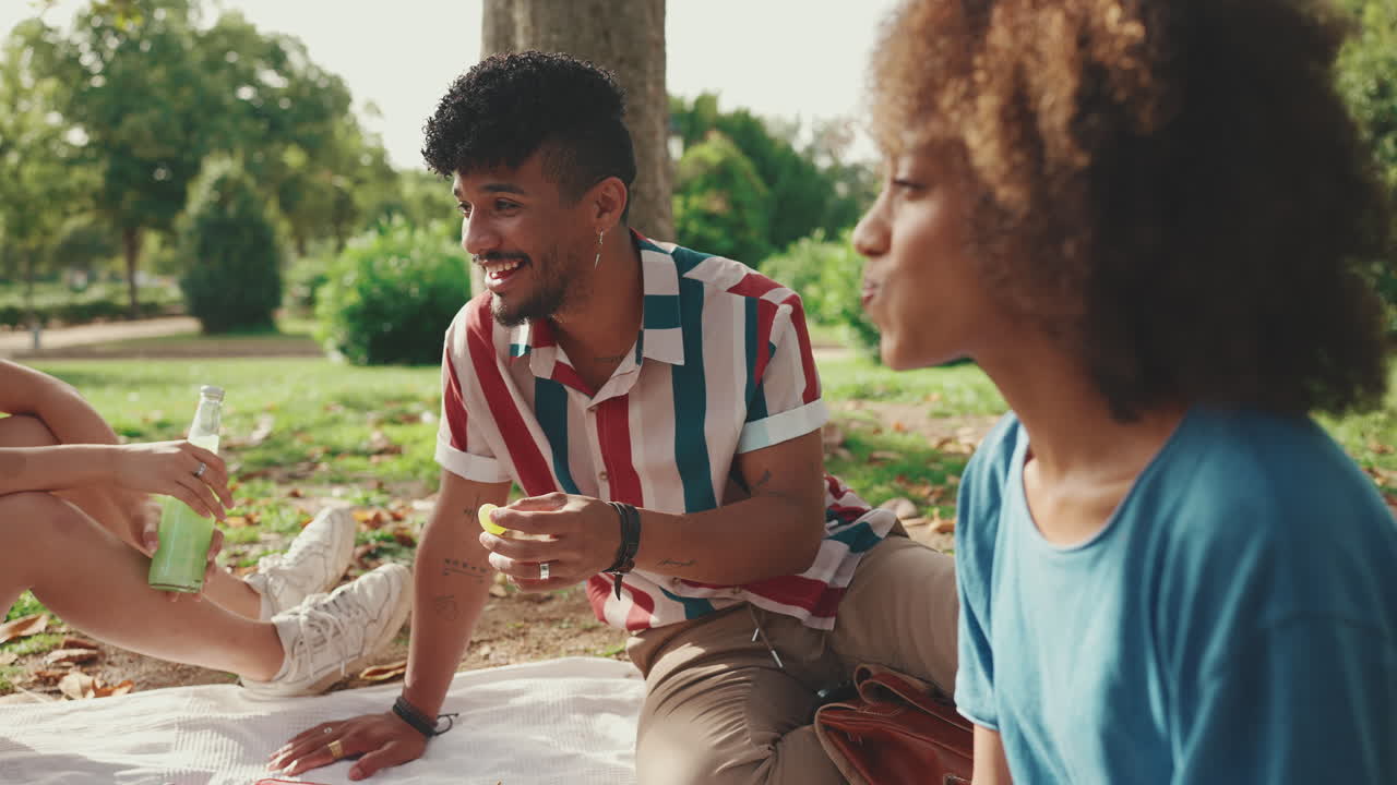 Friends Enjoying a Picnic in the Park