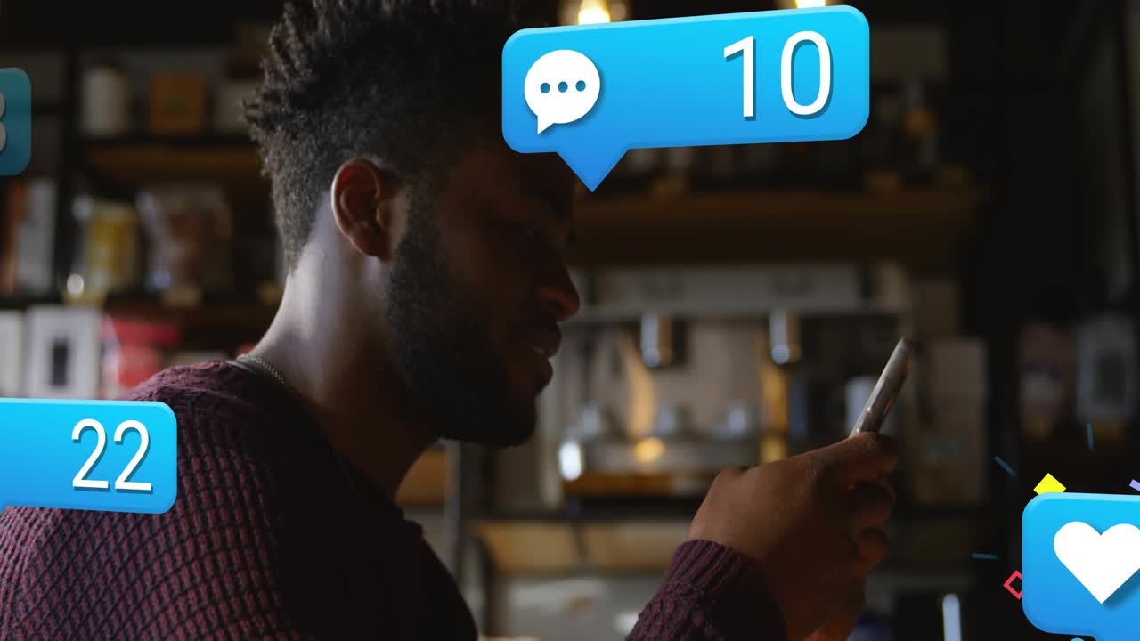 Man scrolling phone at coffee counter tapping to show social media icons, counts rising around him