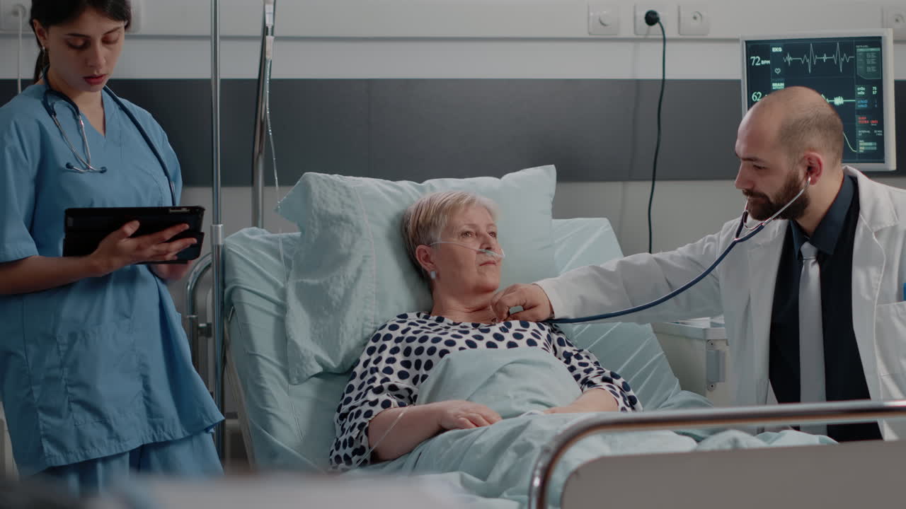 Medical team doing healthcare consultation for senior patient