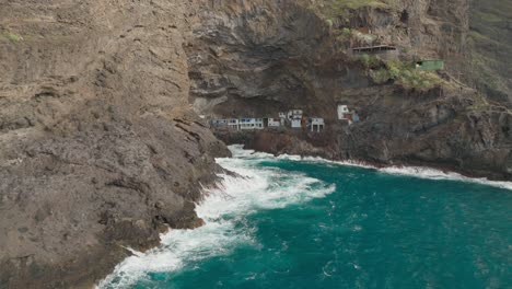 poris de candelaria sheltered in basalt volcanic rock cave on shore of la palma