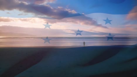 animation of flag of honduras blowing over beach seascape