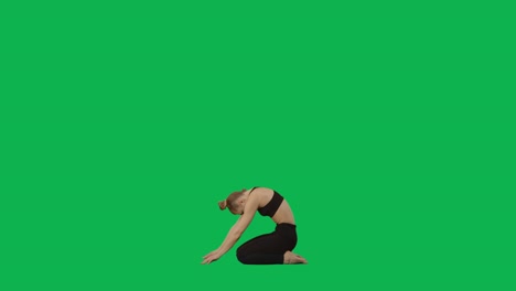 woman doing yoga exercises on green screen