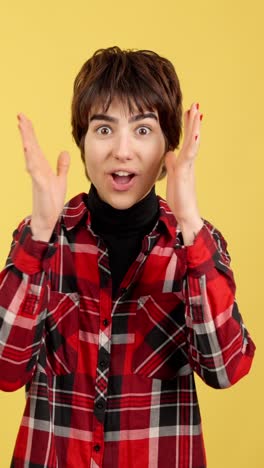 young woman reacting with surprise, shock, and excitement