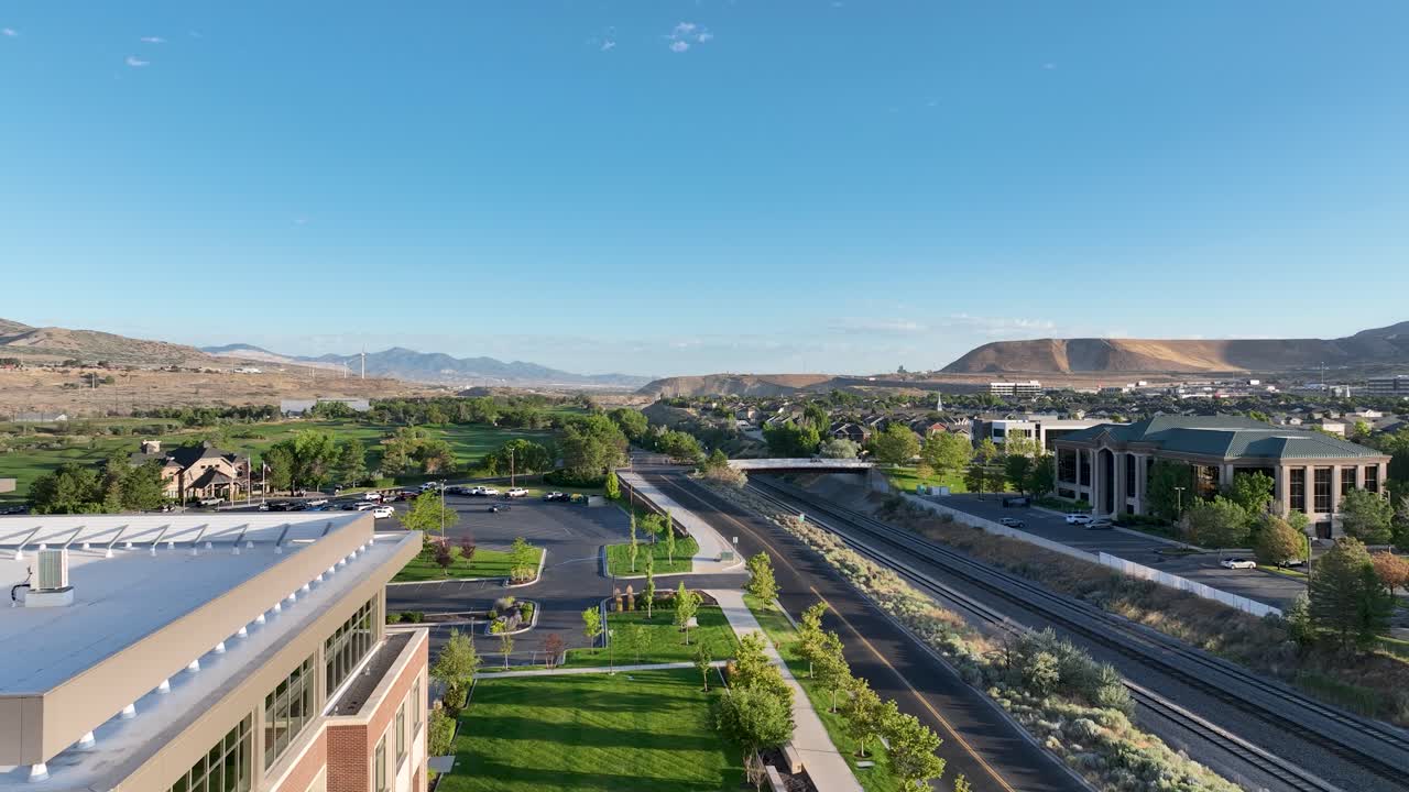 Railroad Tracks Surrounded By Suburban Neighbourhood And Thanksgiving Point Golf Course In Lehi, Utah