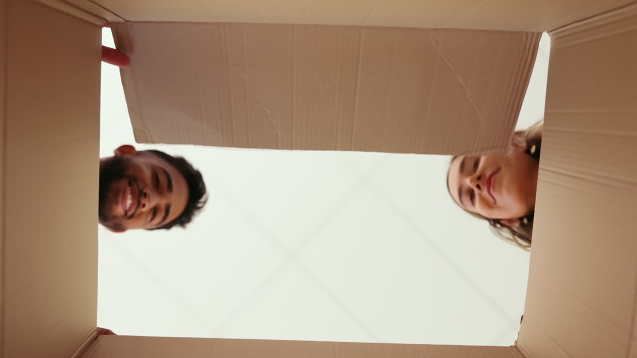 Below, moving house and unpacking with a couple