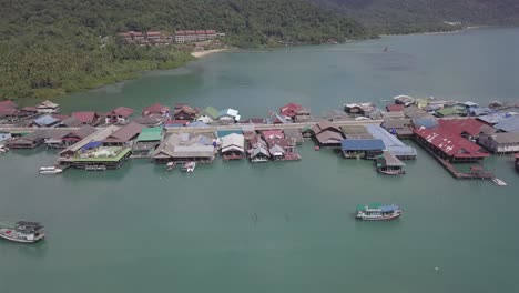 aerial view towards and over the bang bao floating village with colorful houses and roofs at koh chang,thailand on a sunny day.
