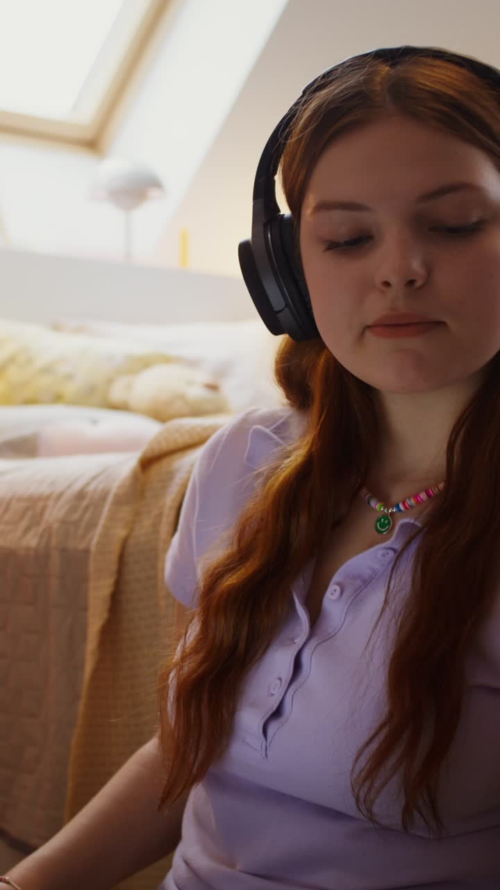 Teenage Girl Listening to Music and Drinking