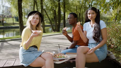 young friends posing outdoors