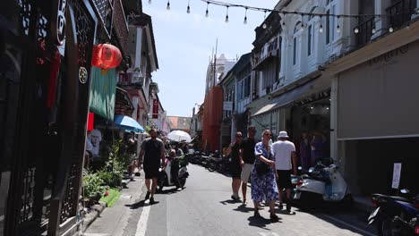 people walking on a bustling street