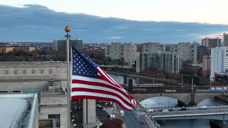 american flag in urban american city