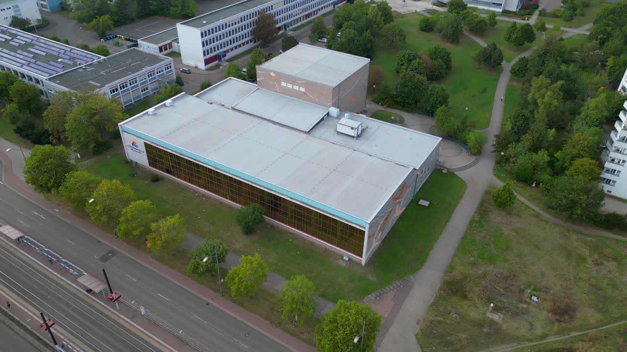 Aerial View of a School Sports Hall and Surrounding Campus
