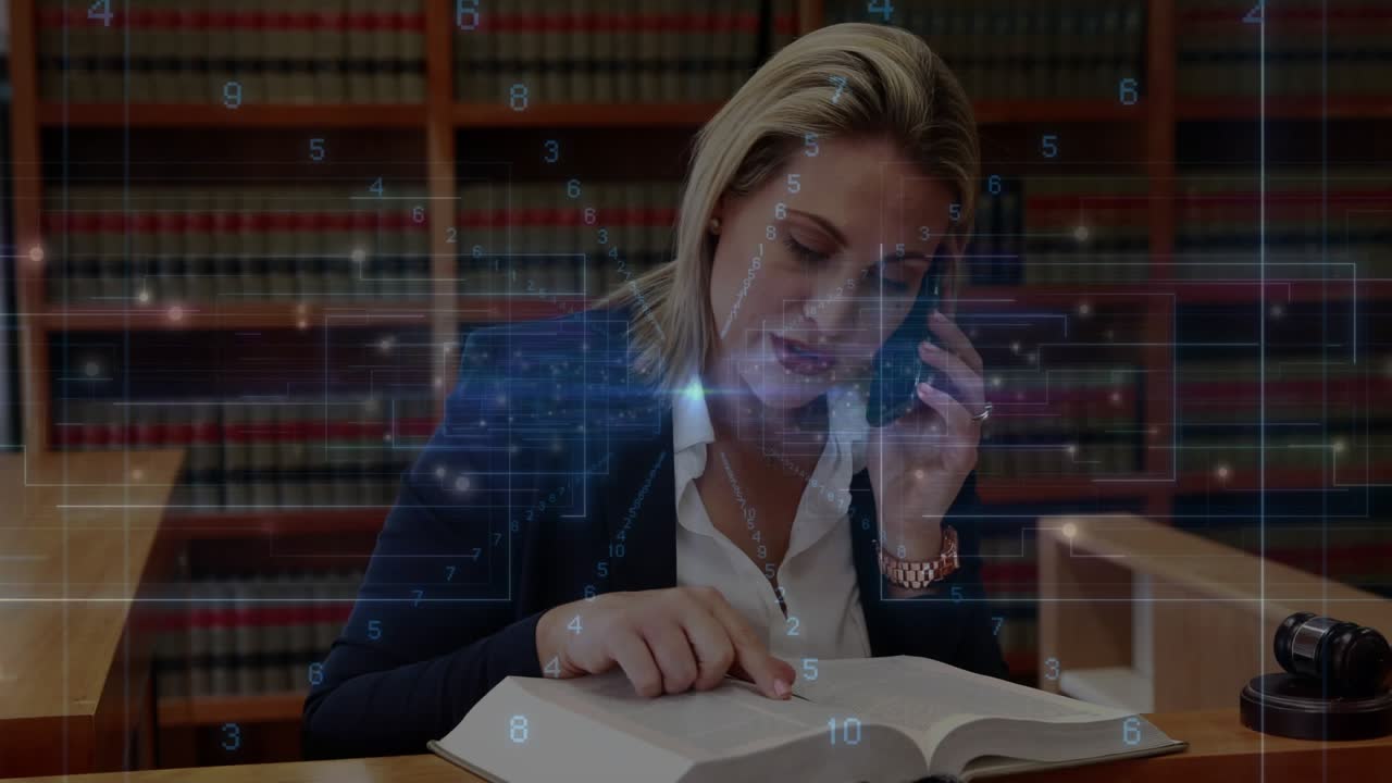 Lawyer taking call, using phone, pointing to law book, checking citation, overlay highlighting text