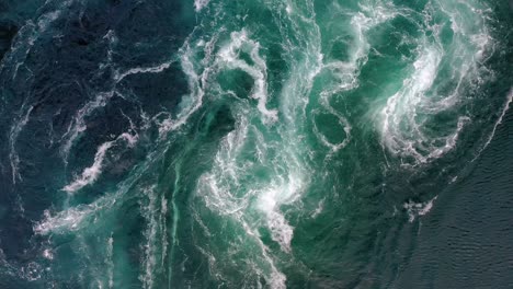 waves of water of the river and the sea meet each other during high tide and low tide.