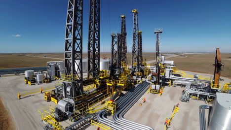 oil and gas drilling operation with rigs and infrastructure