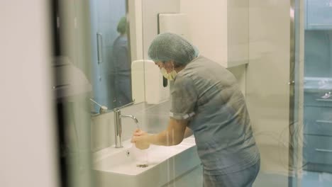 preparing for surgery operation, the doctor washes hands before surgery