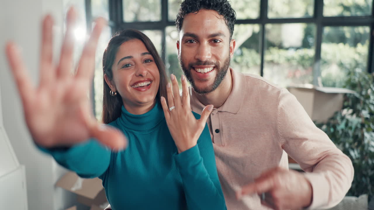 Engaged Couple Showing Off Ring