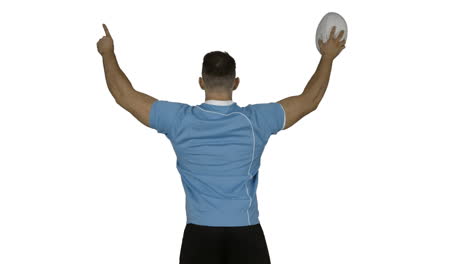 jugador de rugby serio animando con la pelota
