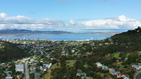 Slow-Motion-Drone-Flight-Of-Iconic-Hobart-City-Buildings-And-Nature-Overlooking-Derwent-River,-Tasmania-Australia-4K