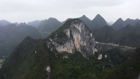 Amazing-karst-mountain-pinnacles,-China-remote-wilderness,-Getu-Valley,-aerial