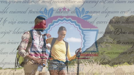 animation of independence day text over smiling diverse couple hiking