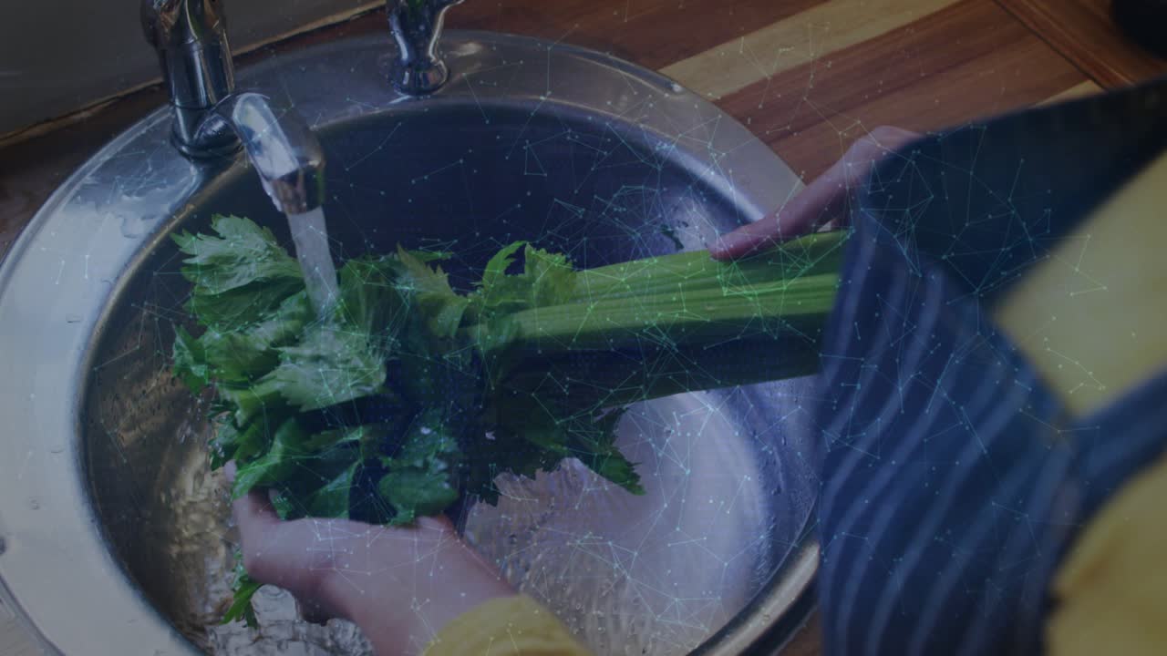 Woman washing celery under running faucet, code intensifying, shield emerging security technology