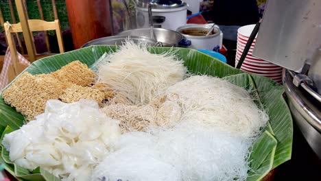 thai noodles varieties closeup bangkok food market steaming