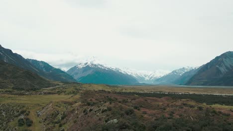 mt cook new zealand drone over looking the base of the mountian uhd