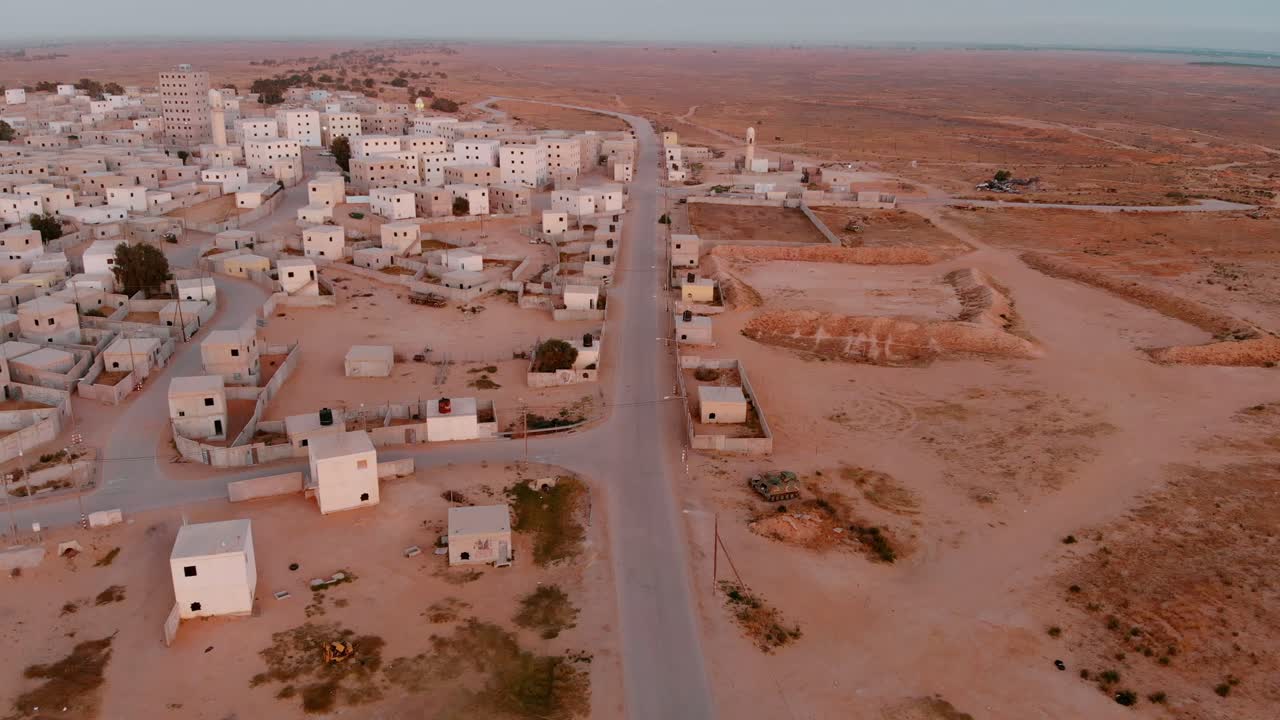 aerial shot of empty road in an old empty city in the desert in palestine near Gaza