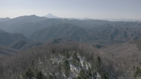 drone shot of winter mountain in japan