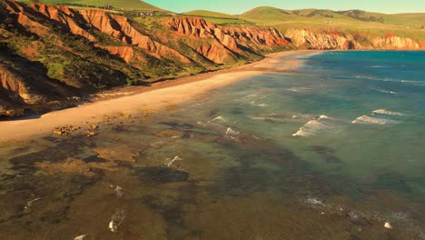 aerial view of seascape along the vast beach on the south coast during summer