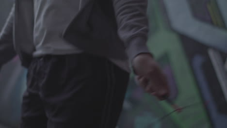 Close-Up-Shot-of-Young-Athletic-Man's-Hands-Whilst-He's-Jumping-Rope---Skipping-in-an-Underpass,-In-Slow-Motion---Ungraded