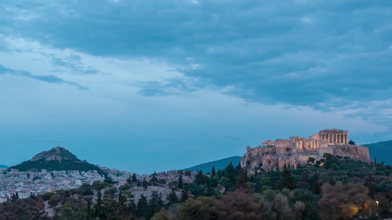 Dusk to night time lapse at Acropolis in Athens with light up