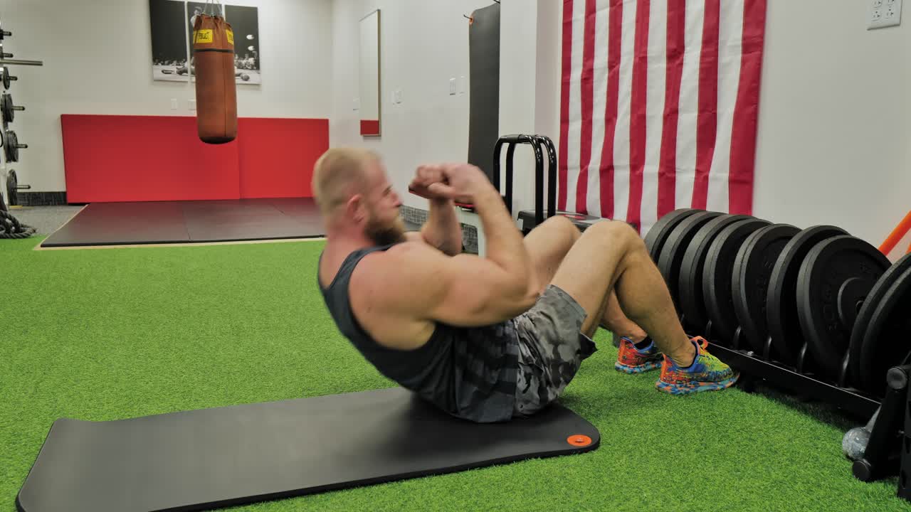 Strong bodybuilder lifting weights. Athletic person effort