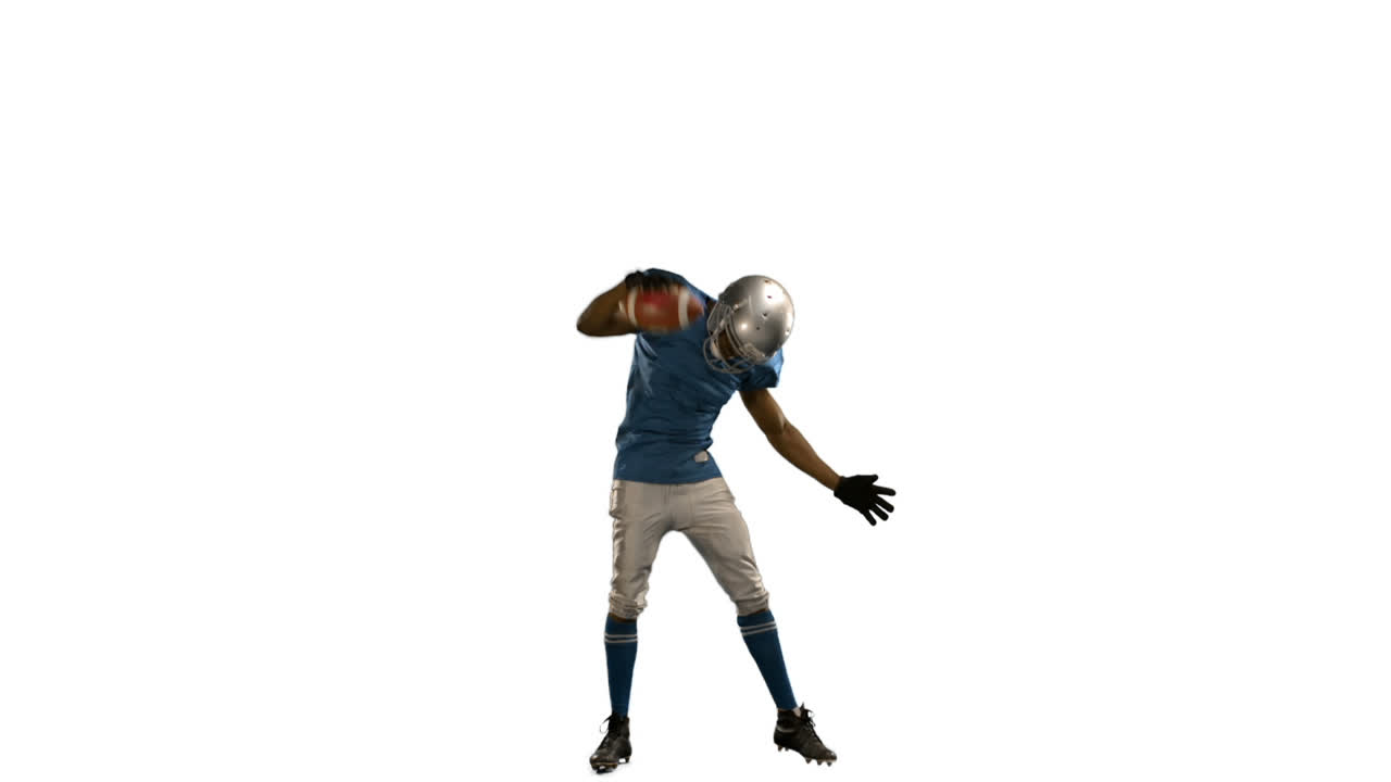 American football player triumphing with raised arms