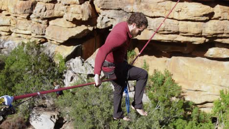 highline athlete balancing on slackline rope 4k