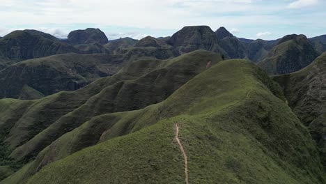 codo de los andes bolivia aerial rises over narrow mountain ridge path