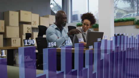 animation of statistical data processing over diverse man and woman discussing over laptop at office